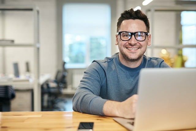 Man discovering creative ways to make money online while working on his laptop.