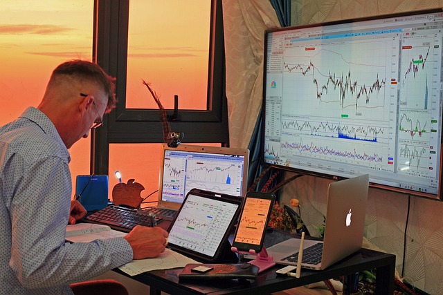 Businessman reviewing financial charts, illustrating investment analysis in digital assets